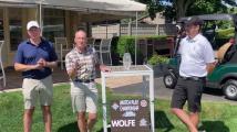 Mike Wolfe receives the 2024 EDGA Match Play Tournament trophy