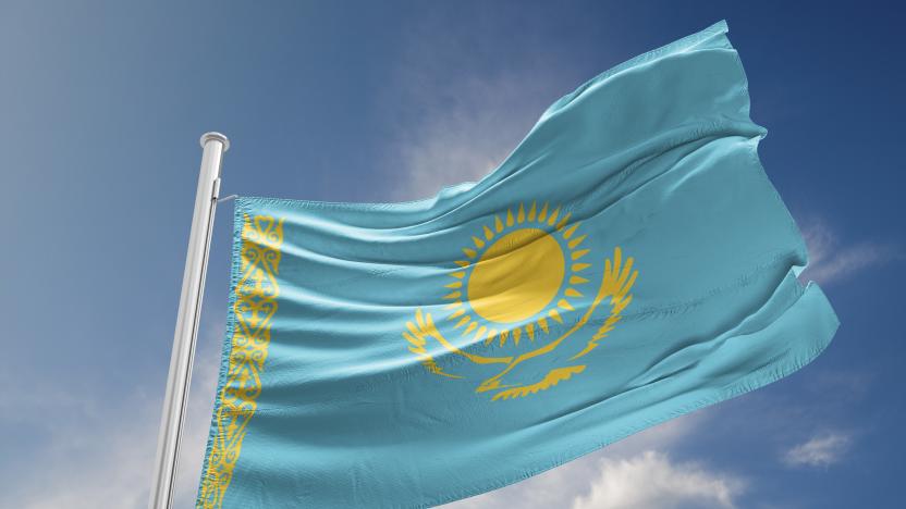 Kazakhstan flag is waving at a beautiful and peaceful sky in day time while sun is shining. 3D Rendering