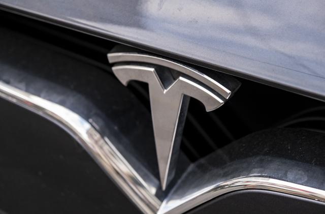 Tesla car badge on 2nd December 2022 in London, United Kingdom. Tesla Inc. is an American multinational automotive and clean energy company which designs and manufactures electric vehicles. (photo by Mike Kemp/In Pictures via Getty Images)