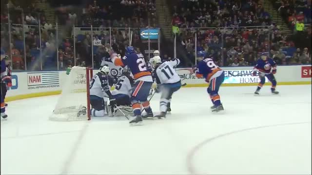 Dustin Byfuglien helps save a goal