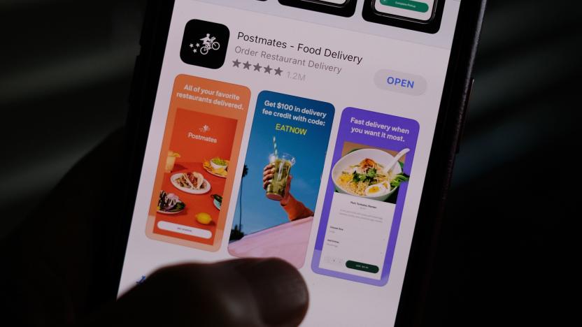 This illustration photo taken on June 30, 2020 shows the logo of delivery app Postmates on a smartphone screen in Los Angeles. - Uber is in talks to buy food delivery app Postmates in a multibillion dollar deal, US media reported. (Photo by Chris DELMAS / AFP) (Photo by CHRIS DELMAS/AFP via Getty Images)