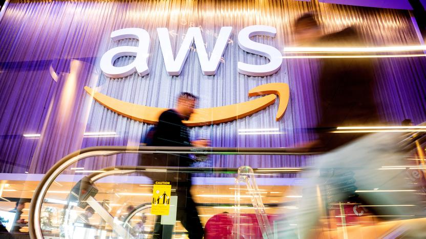 Attendees walk through AWS re:Invent 2022, a conference hosted by Amazon Web Services (AWS), in Las Vegas, Nevada, U.S., November 30, 2022. Noah Berger/AWS/Handout via REUTERS THIS IMAGE HAS BEEN SUPPLIED BY A THIRD PARTY. MANDATORY CREDIT