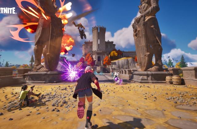 A character runs into battle in Fortnite as an explosion is set off to the side.