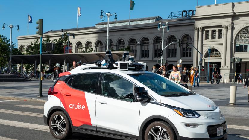 A General Motors Cruise self driving car, often referred to as a robotaxi, drives in front of the Ferry Building on the Embarcedero, San Francisco, California, August 17, 2023. (Photo by Smith Collection/Gado/Getty Images)