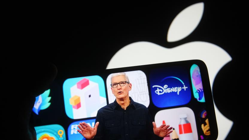 UKRAINE - 2021/06/07: In this photo illustration the Apple CEO Tim Cook is seen on a mobile phone screen during an Apple Worldwide Developers Conference (WWDC) in Cupertino, California, US, in front of Apple logo in the background. 
Apple has started its Worldwide Developers Conference (WWDC), an information technology conference, where it presented the iOS 15, iPadOS 15, macOS 12 and watchOS 8. WWDC 2021 is being held from June 7 to June 11, 2021 as an online-only conference, due to the COVID-19 pandemic. (Photo Illustration by Pavlo Gonchar/SOPA Images/LightRocket via Getty Images)