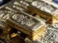 Gold Slips After Topping $2,400 as Rally Is Seen as Overextended