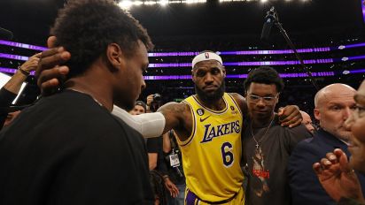 Getty Images - LOS ANGELES, CALIFORNIA - FEBRUARY 07: LeBron James #6 of the Los Angeles Lakers reacts with Bronny James and Bryce James after scoring to pass Kareem Abdul-Jabbar to become the NBA's all-time leading scorer, surpassing Abdul-Jabbar's career total of 38,387 points against the Oklahoma City Thunder at Crypto.com Arena on February 07, 2023 in Los Angeles, California. NOTE TO USER: User expressly acknowledges and agrees that, by downloading and or using this photograph, User is consenting to the terms and conditions of the Getty Images License Agreement. (Photo by Harry How/Getty Images)