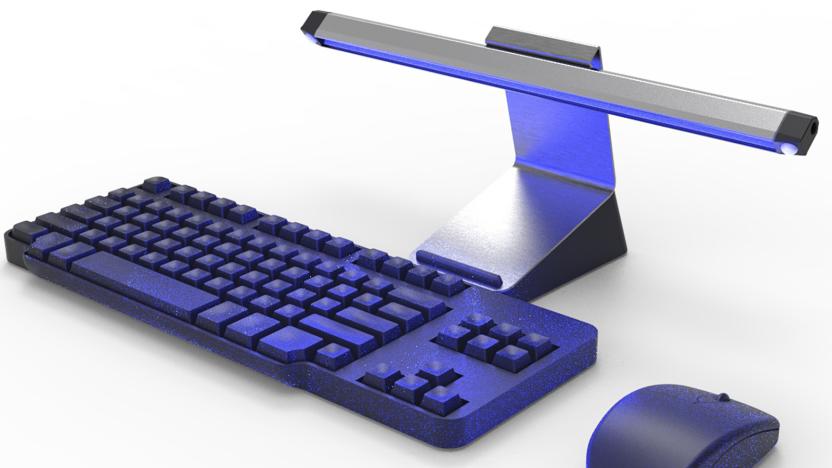 Targus UV-C LED disinfection light cleaning a keyboard and mouse