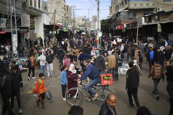 Palestinians crowd at a market area in Rafah in the southern Gaza Strip on March 3, 2024, amid the ongoing conflict between Israel and the Hamas movement. (Photo by AFP) (Photo by -/AFP via Getty Images)