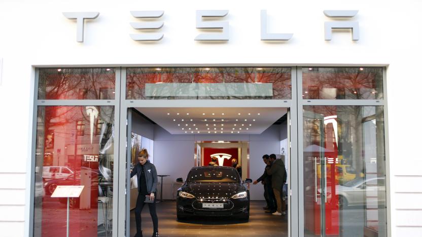 A Tesla car 'Model S' sits in a dealership in Berlin, Germany, November 18, 2015. REUTERS/Hannibal Hanschke 