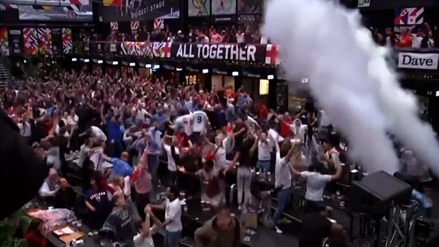 England fans in London celebrate three goals before halftime