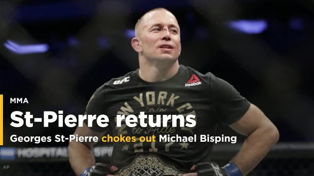 UFC 217: Georges St-Pierre chokes out Michael Bisping to win middleweight title in triumphant return