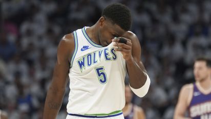 Associated Press - Minnesota Timberwolves guard Anthony Edwards (5) walks on the court during the first half of Game 2 of the team's NBA basketball first-round playoff series against the Phoenix Suns, Tuesday, April 23, 2024, in Minneapolis. (AP Photo/Abbie Parr)