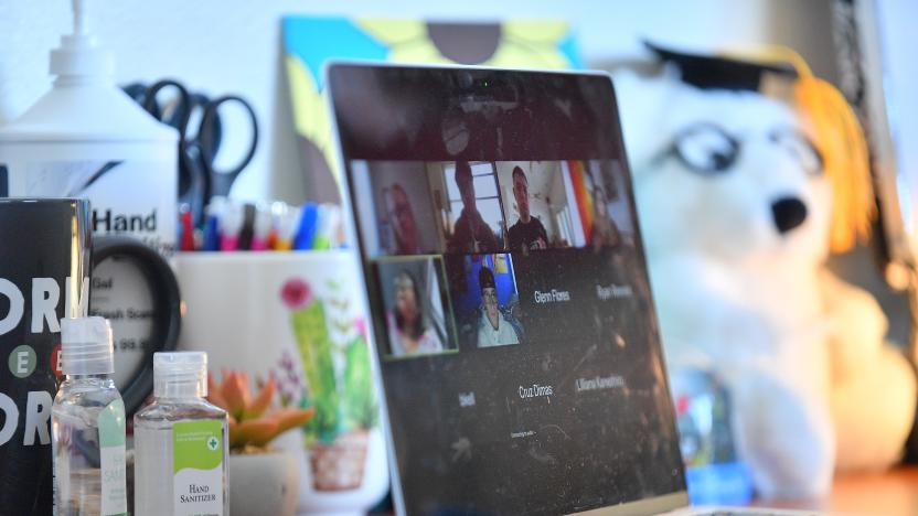 ALBUQUERQUE, NEW MEXICO - AUGUST 17:  Bottles of hand sanitizer sit next to a laptop showing a Zoom meeting as students begin classes amid the coronavirus (COVID-19) pandemic on the first day of the fall 2020 semester at the University of New Mexico on August 17, 2020 in Albuquerque, New Mexico. To help prevent the spread of COVID-19, the university has moved to a hybrid instruction model that includes a mixture of in-person and remote classes. According to the school, about 70 percent of classes are being taught online.  (Photo by Sam Wasson/Getty Images)