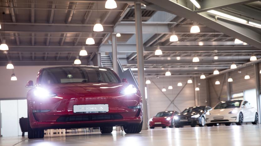 21 October 2020, Hamburg: A Tesla Model 3 (l) and other Tesla models are on display in the new Tesla Service Center. Photo: Christian Charisius/dpa (Photo by Christian Charisius/picture alliance via Getty Images)