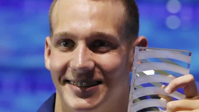 Seven's the charm: Dressel ties Phelps' record with 7th gold