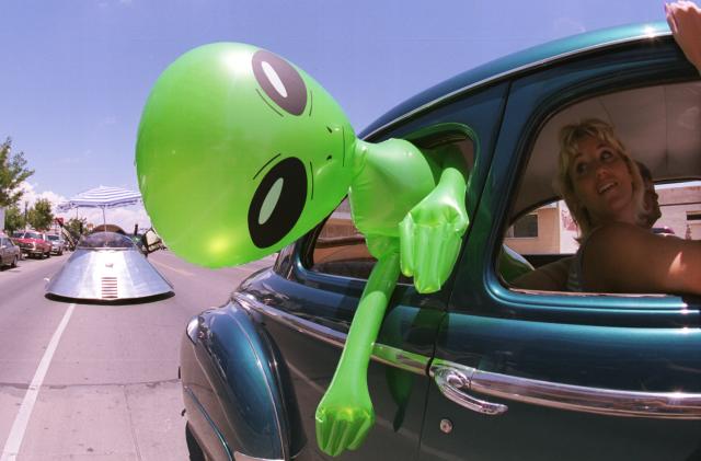 372049 02: An alien doll hangs out a car window in downtown Roswell, New Mexico July 1, 2000 as part of the annual UFO Encounter, which runs through July 4, 2000. The annual festival stems from a mysterious crash northwest of Roswell in 1947. The Army initially said it was a UFO crash, but quickly backed off that report. The Pentagon has since said it was a top-secret balloon crash, but UFO enthusiasts don''t believe that story, which gives rise to what has become known as the "Roswell Incident". (Photo by Joe Raedle/Newsmakers)