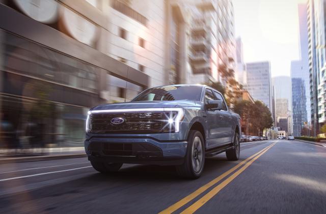 2022 Ford F-150 Lightning Platinum. Pre-production model with available features shown. Available starting spring 2022.