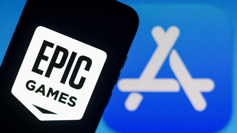 BRAZIL - 2021/09/13: In this photo illustration the Epic Games logo seen displayed on a smartphone with an Apple Store logo in the background. (Photo Illustration by Rafael Henrique/SOPA Images/LightRocket via Getty Images)