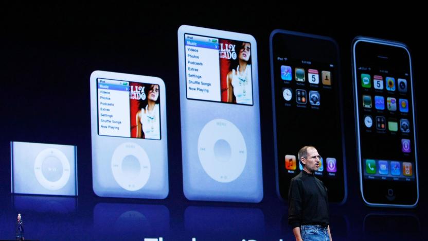 SAN FRANCISCO - SEPTEMBER 05:  Apple CEO Steve Jobs speaks in front of a display of the new iPod products during an Apple Special event September 5, 2007 in San Francisco, California. Jobs announced a new generation of iPods as well as a partnership with Starbucks to access music being played at Starbucks coffee shops with the new iPod Touch.  (Photo by Justin Sullivan/Getty Images)