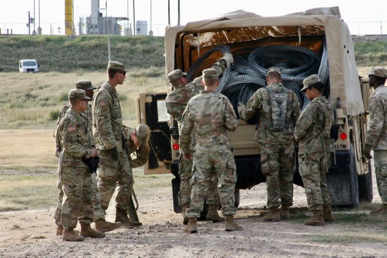 The Pentagon said it had approved a request from the Department of Homeland Security to keep thousands of troops deployed at the border with Mexico (soldiers pictured November 2018) to help fight illegal immigration