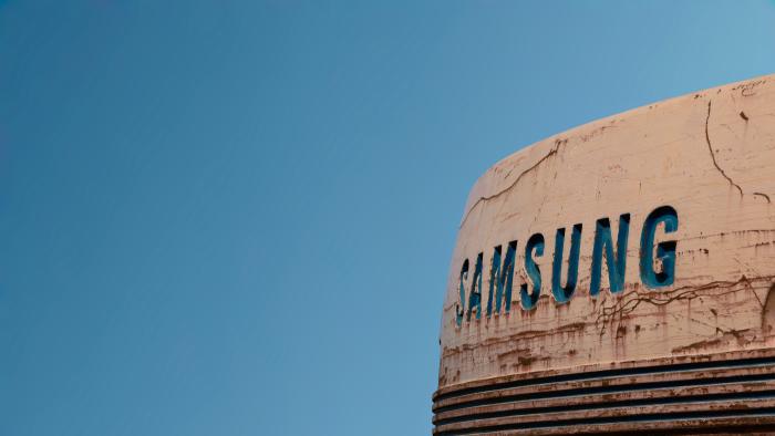 Samsung written on a sand-soaked building. 