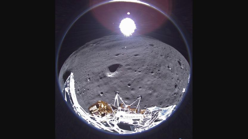 A wide angle view from the Odysseus moon lander showing a portion of the spacecraft, the moon, and Earth in the faraway distance