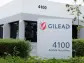 Gilead posts quarterly loss on acquisition charge, revenue rises 5%