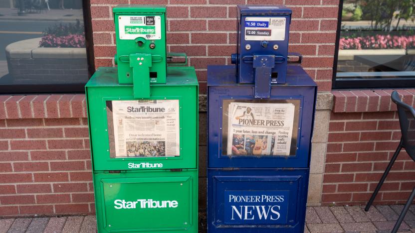 Maple Grove, Minnesota - July 21, 2019: Newspaper vending machine kiosks for the StarTribune and St Paul Pioneer Press, the two major daily papers in Twin Cities area