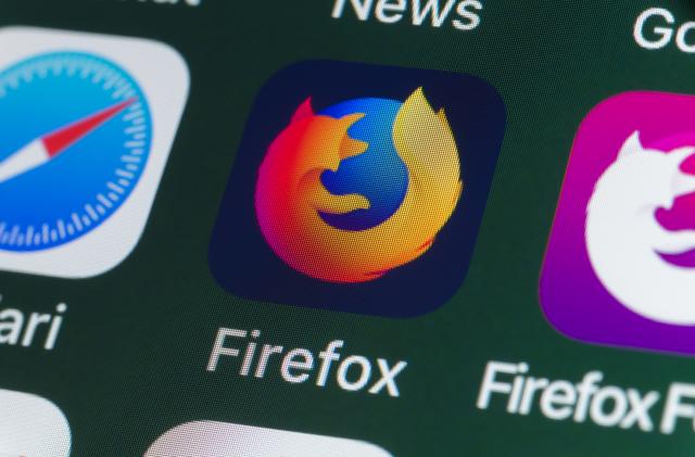 London, UK - July 31, 2018: The buttons of the internet browser app Firefox, surrounded by Safari, Firefox Focus, News and other apps on the screen of an iPhone.