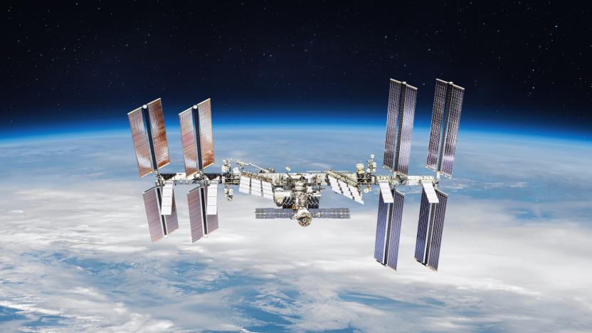 International space station on orbit of the Earth planet. View from outer space.ISS. Earth with clouds and blue sky. Elements of this image furnished by NASA (url: https://images-assets.nasa.gov/image/iss056e201225/iss056e201225~small.jpg https://www.nasa.gov/sites/default/files/styles/full_width_feature/public/thumbnails/image/iss065e333863.jpg)