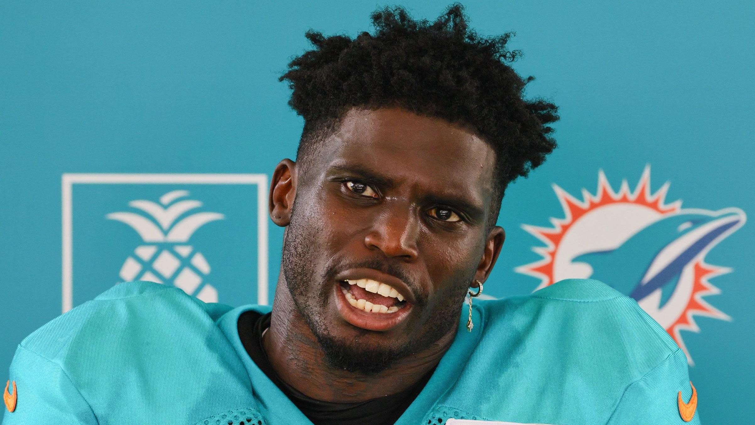 Dolphins star Hill detained by police before game