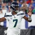 NFL ref hits Seahawks' Geno Smith with great line as QB protests penalty:  'I'm talking to America here'