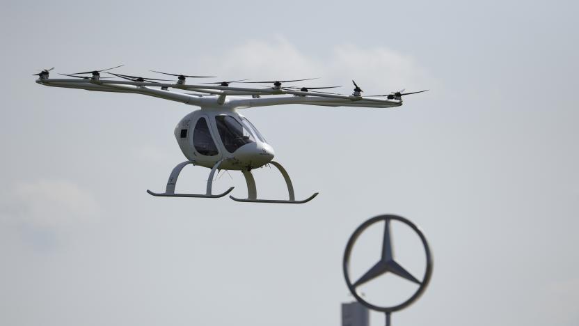 STUTTGART, GERMANY - SEPTEMBER 14: A Volocopter multirotor passenger aircraft takes off in front of the Daimler logo during the Vision Smart City event on September 14, 2019 in Stuttgart, Germany. Vision Smart City is a two-day event focusing on innovation around mobility of the future.  (Photo by Andreas Gebert/Getty Images)