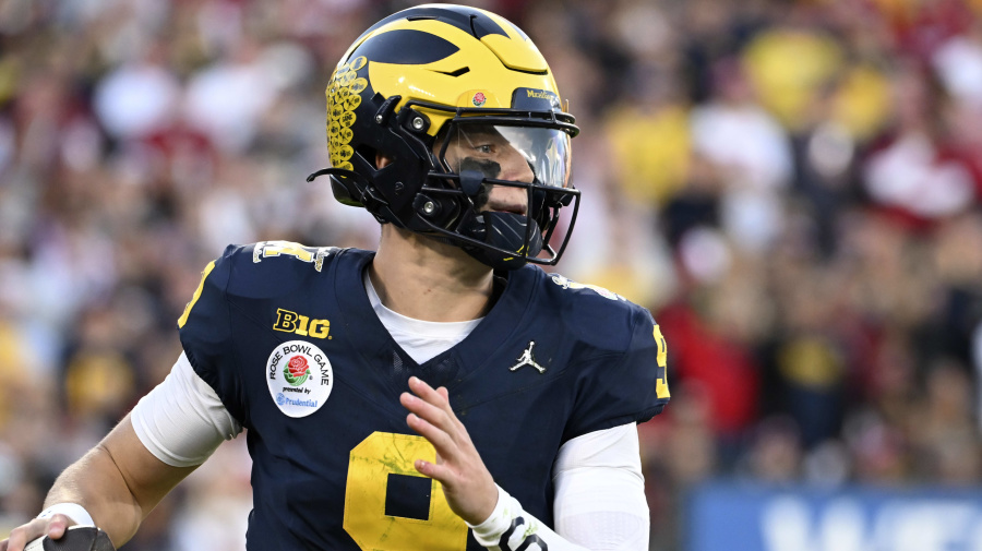 Associated Press - FILE - Michigan quarterback J.J. McCarthy (9) rolls out during the second half of the Rose Bowl CFP NCAA semifinal college football game against Alabama Monday, Jan. 1, 2024, in Pasadena, Calif. McCarthy is a possible first round pick in the NFL Draft.(AP Photo/Kyusung Gong, File)