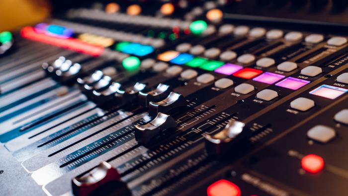 Studio mixing panel.Sound Mixer, Audio Mixer Slide. Music equipment blurred background.