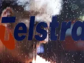 Australia's Telstra falls after cutting annual earnings view