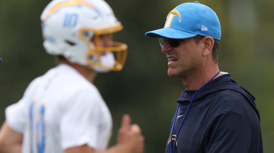 Getty Images - COSTA MESA, CALIFORNIA - MAY 20: Head coach Jim Harbaugh and quarterback Justin Herbert during a Los Angeles Chargers OTA offseason workout on May 20, 2024 in Costa Mesa, California. (Photo by Harry How/Getty Images)