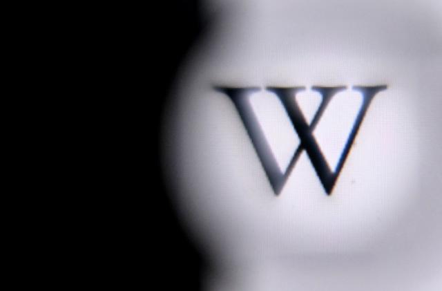 A picture taken on April 15, 2022 in Moscow shows the Wikipedia logo is seen on a tablet screen. (Photo by Kirill KUDRYAVTSEV / AFP) (Photo by KIRILL KUDRYAVTSEV/AFP via Getty Images)