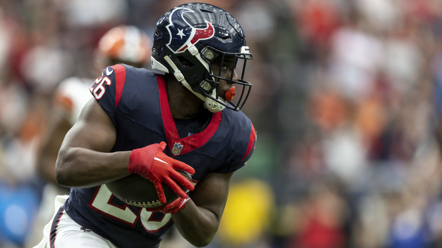 Getty Images - HOUSTON, TEXAS - JANUARY 13: Devin Singletary #26 of the Houston Texans runs with the ball during an NFL wild-card playoff football game between the Houston Texans and the Cleveland Browns at NRG Stadium on January 13, 2024 in Houston, Texas. (Photo by Michael Owens/Getty Images)