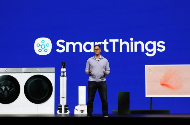 LAS VEGAS, NEVADA - JANUARY 04:  SmartThings Head of Products & Engineering Mark Benson speaks during the Samsung keynote address at CES 2022 at The Venetian Las Vegas on January 4, 2022 in Las Vegas, Nevada. CES, the world's largest annual consumer technology trade show, is being held in person from January 5-7, with some companies deciding to participate virtually only or canceling their attendance due to concerns over the major surge in COVID-19 cases.  (Photo by Ethan Miller/Getty Images)