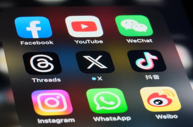 Shanghai,China-July 30th 2023: X (new Twitter), Threads, Facebook, YouTube, Instagram, WeChat, WhatsApp. Douyin(TikTok) and Sina Weibo app icons. Assorted online social media software brands