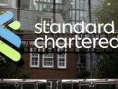 Exclusive-StanChart suspends new offshore channel investments by China clients