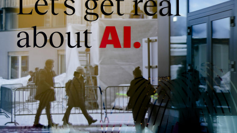 People reflected in a window of a hotel at the Davos Promenade with a slogan about AI alongside the World Economic Forum in Davos, Switzerland, Monday, Jan. 15, 2024. The AI technology has taken a large and growing slice of attention in Davos, this year the theme of Artificial Intelligence "as a driving force for the economy and society" will get about 30 separate sessions. (AP Photo/Markus Schreiber)