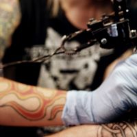 Tattoo artists are covering up racist and hateful tattoos for free