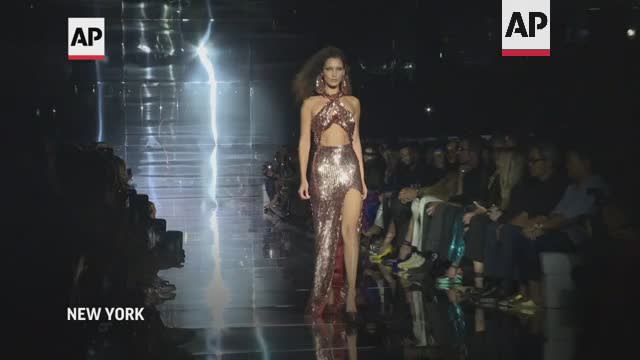 Tom Ford closes Fashion Week with big hair, miles of sparkle