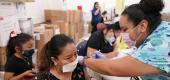 A nurse administers a COVID-19 vaccine to a patient. (Lynne Sladky/AP)