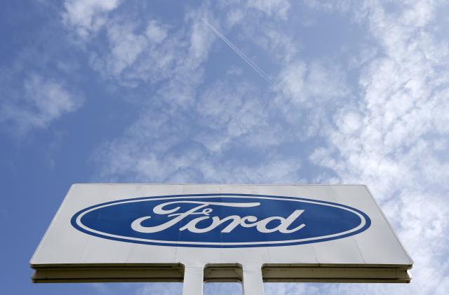 The logo of Ford Motor Co is seen at the company's assembly plant after an emergency meeting with the plant management in Genk October 24, 2012. Ford Motor Co announced to unions on Wednesday that it will close the factory employing 4,300 workers in the Belgian town of Genk, as it tries to stem losses in Europe and match capacity to tumbling demand. REUTERS/Francois Lenoir (BELGIUM - Tags: TRANSPORT BUSINESS EMPLOYMENT LOGO)