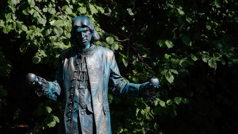 An artist called "Isaac Newton" takes part in the festival "Statues en Marche" in Marche-en-Famenne, Belgium, July 22, 2018. REUTERS/Yves Herman