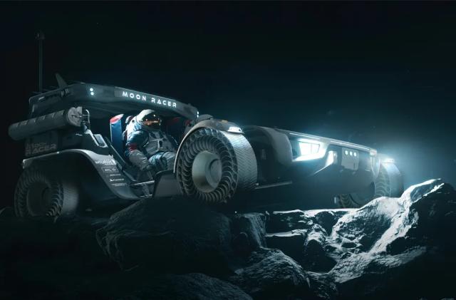 Intuitive Machines' concept lunar terrain vehicle Moon Racer is pictured in a rendering, showing two astronauts riding the vehicle on rocky ground